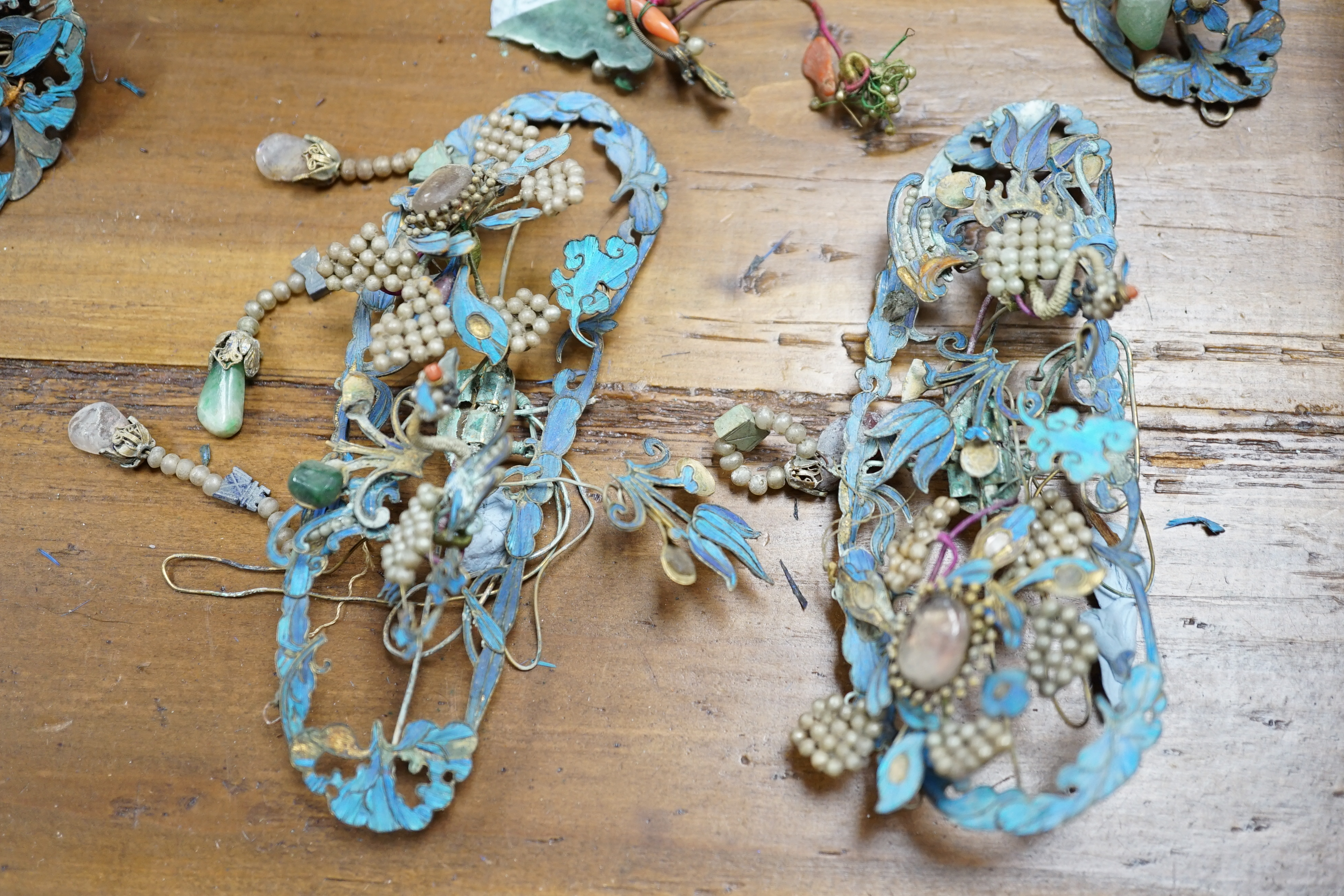 A group of eight Chinese kingfisher feather, jade, seed pearl, coral and hardstone mounted headdresses and ornaments, late Qing dynasty, some losses